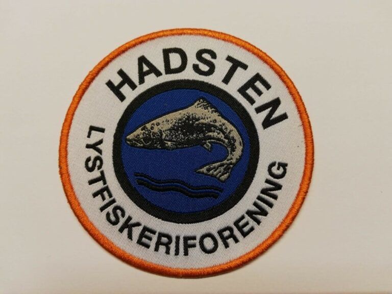 Broderet HLF logo sælges